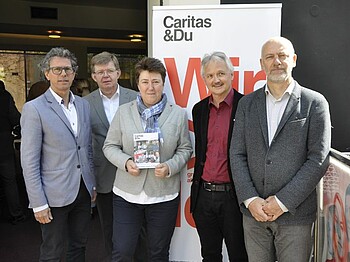 Die Caritas Geschäftsleitung präsentiert den Wirkungsbericht